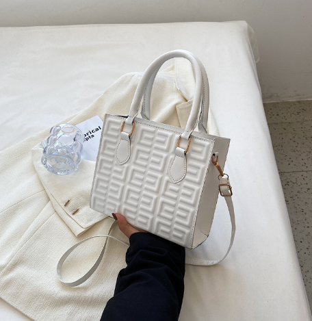 Quilted square box bag in pebbled vegan leather with greek key pattern, view 2