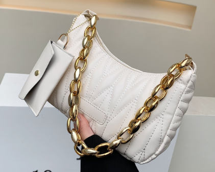 Quilted hobo bag in cream vegan leather with chunky gold chain handle