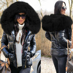 Hooded puffer jacket in glossy black with deep faux fur hood trim