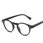 Round tortoise acetate sunglasses with green polarized lenses, view 5