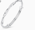 Braided silver bangle bracelet with textured twined strand