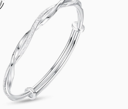 Braided silver bangle bracelet with textured twined strand
