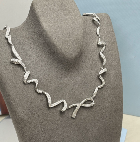 Sterling silver wave necklace with continuous undulating ribbon